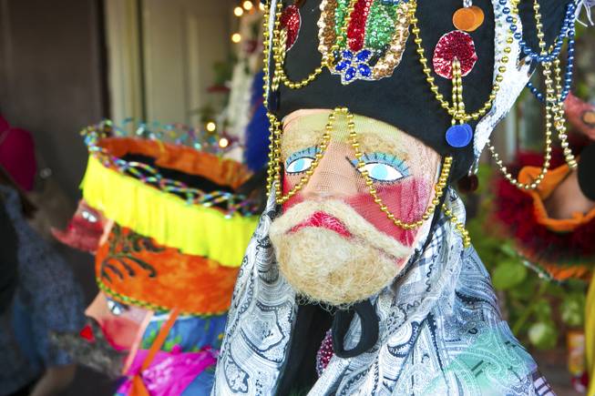 This traditional Morelas dance mask has a blond beard, beads and depictions of the Virgin of Guadalupe and a dove. The Comparza Morelense, a cultural dance troupe from Las Vegas, has been invited to perform at President Obama's inauguration parade on January 21.